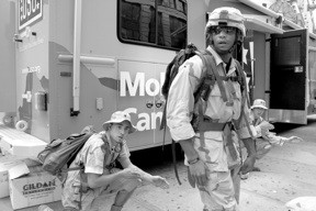 Operation First Casualty: Iraq Veterans Against the War members enact common scenes from the Iraq Occupation in the streets of New York City, May 2007. Photo: Lovella Calica