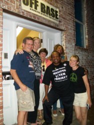 Tom Palumbo, Cindy Sheehan, Connie Hannah, Jame Bailey, Doreen Lake, and Jen St.Clair outside OffBase during the Benefit with Friends gathering last summer. By Ann Williams.