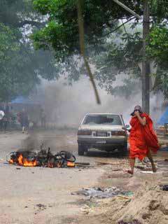 Burmese monk running