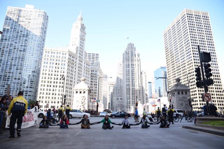 Press Release: Activists Lockdown Chicago Streets to Denounce Islamophobic & Hyper-Militarized SWAT Training