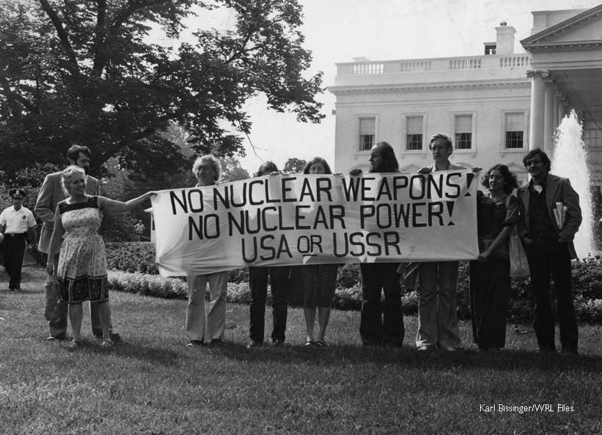 On the White House lawn (l to r): Van Zwisohn, Grace Paley, Ralph DiGia, Cathy Carlson, Gail Bederman, Warren Hoskins, Ed Hedemann, Karen Malpede and Glenn Pontier. Also arrested and not pictured are Linnea Capps and photographer Karl Bissinger. Photo: Karl Bissinger/WRL Files